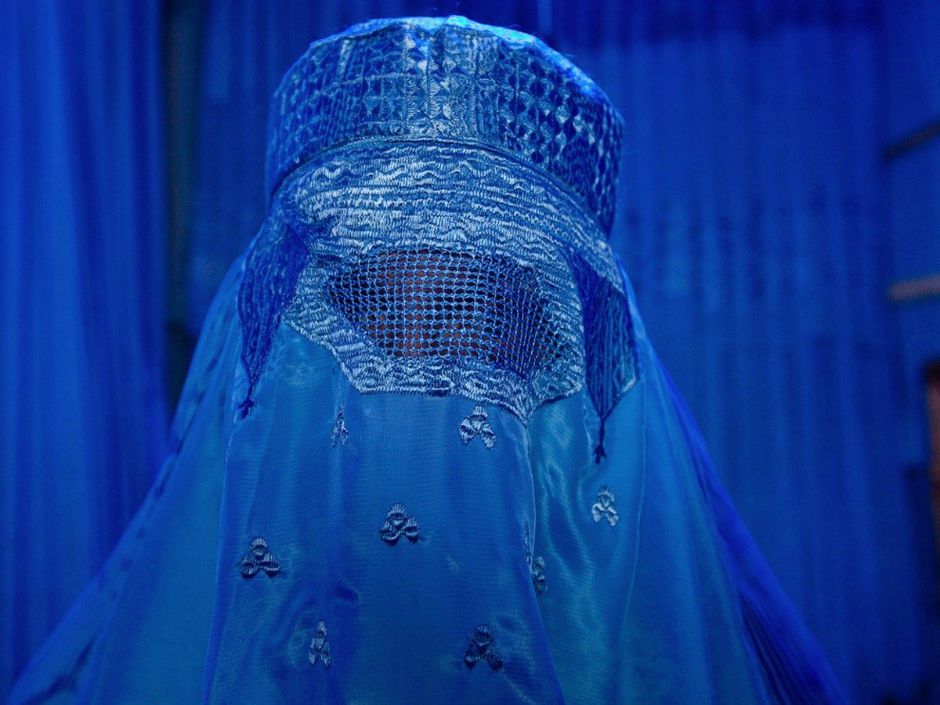 one-of-garfors-friends-whom-he-was-traveling-with-took-this-photo-of-garfors-trying-on-a-burqa-in-afghanistan-the-photo-later-a